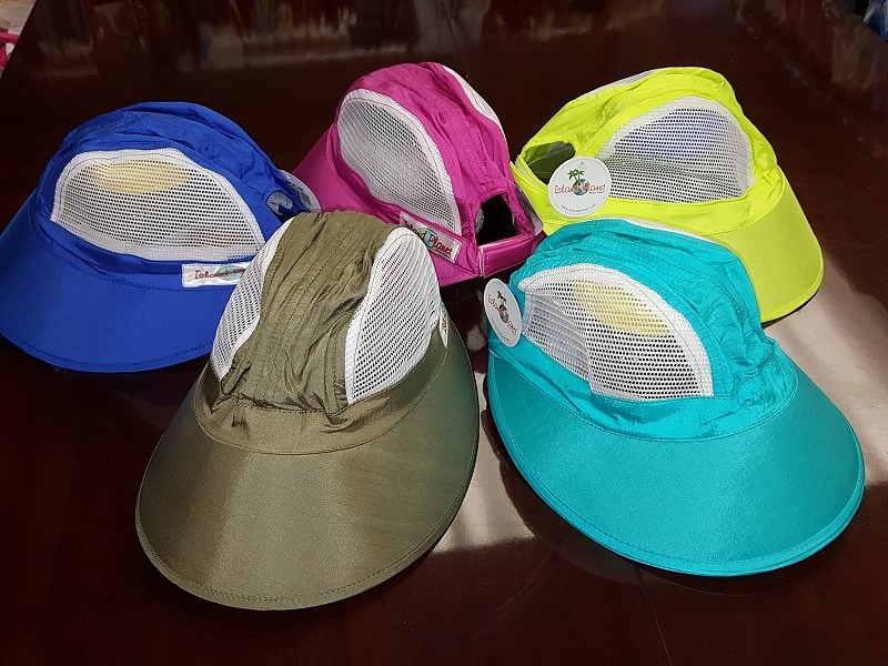 Tennis Hat made of Parachute Nylon in wonderfully exotic colors features airflow mesh sides and adjustable velcro closing!<br /><br class=